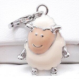New 925 sterling silver and enamel lamb charm.  Lobster claw clasp.